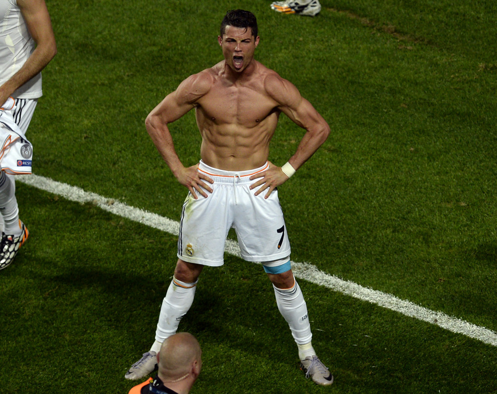 Real's Cristiano Ronaldo celebrates after scoring during the Champions League final soccer match between Atletico Madrid and Real Madrid in Lisbon, Portugal, Saturday, May 24, 2014. (AP Photo/Paulo Duarte)