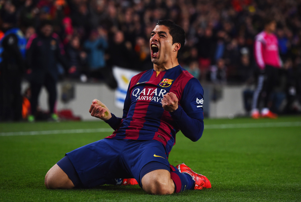 BARCELONA, SPAIN - MARCH 22:  Luis Suarez of Barcelona celebrates as he scores their second goal during the La Liga match between FC Barcelona and Real Madrid CF at Camp Nou on March 22, 2015 in Barcelona, Spain.  (Photo by David Ramos/Getty Images) ORG XMIT: 504075103 ORIG FILE ID: 467269556