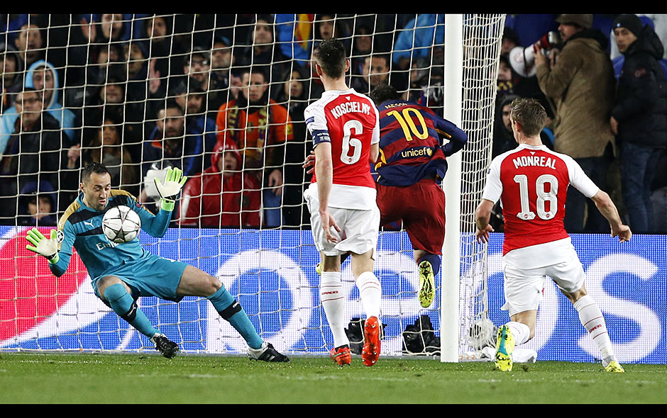 Football Soccer - FC Barcelona v Arsenal - UEFA Champions League Round of 16 Second Leg - The Nou Camp, Barcelona, Spain - 16/3/16 Barcelona's Lionel Messi has a shot saved by Arsenal's David Ospina Action Images via Reuters / Carl Recine Livepic EDITORIAL USE ONLY.